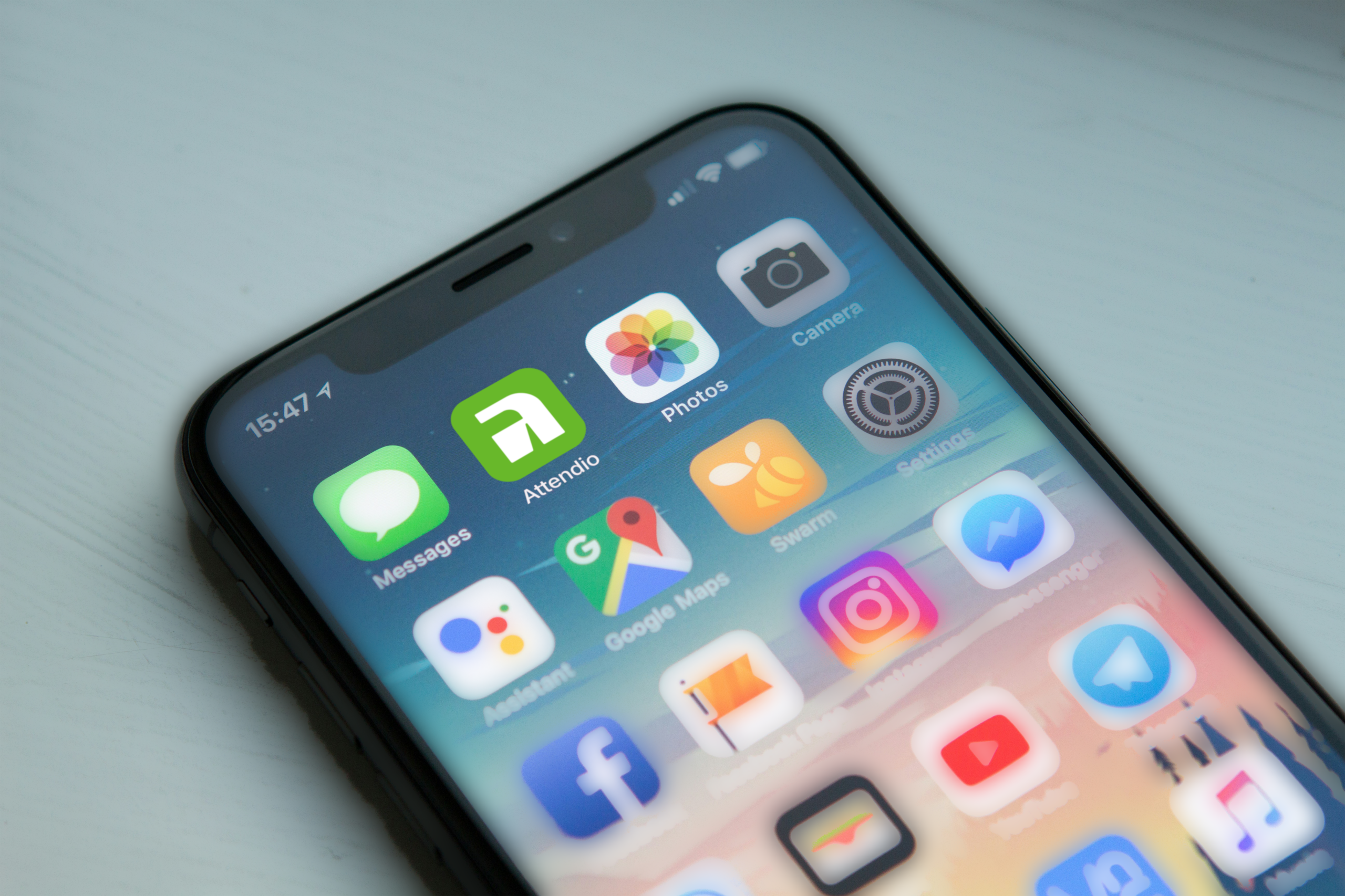 Attendio app in een telefoonmockup