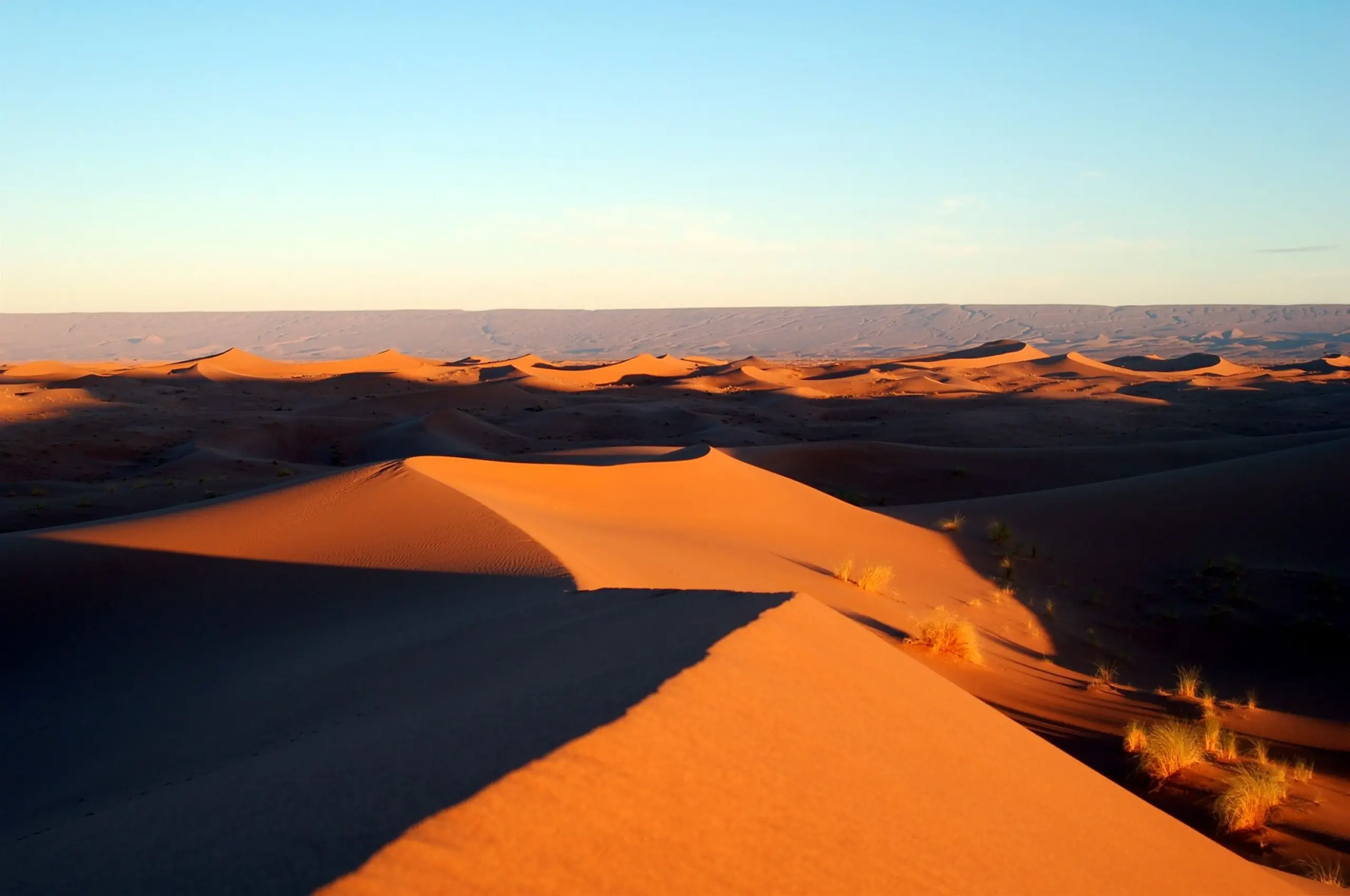 Mountain of sand piled in the sahara desert